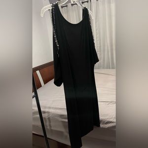 Little Black Dress • Chic • Stylish • Billowed sleeves • Drapey • Alluring back